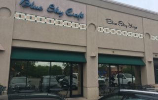 Storefront of Blue Sky Cafe and Blue Sky Yoga showing window film in Golden, CO